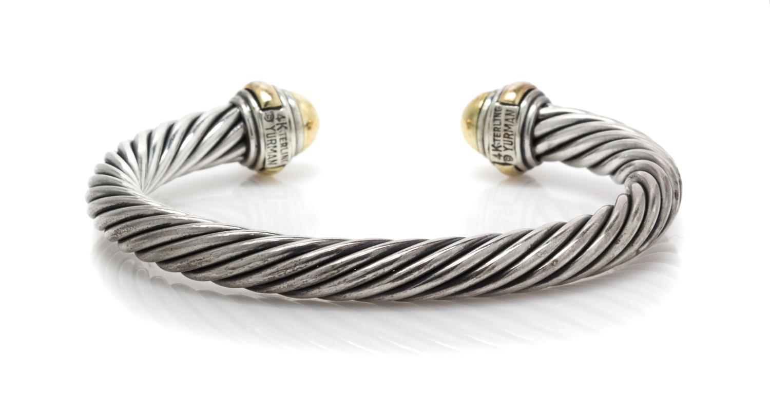 A 14 Karat Yellow Gold and Sterling Silver "Cable Classics" Bangle Bracelet, David Yurman, 28.10 dwts.