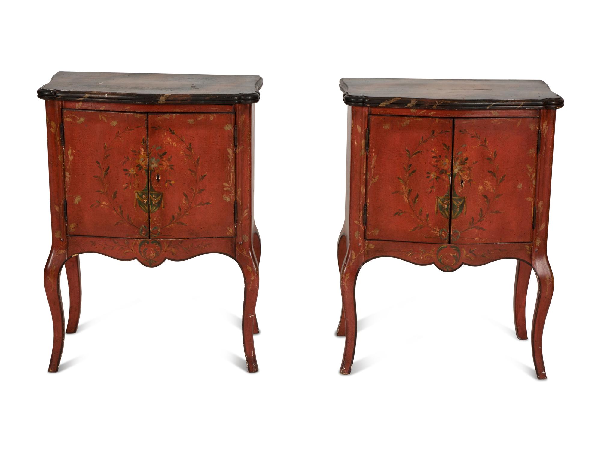 A Pair of Venetian Style Red Painted Cabinets