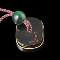 A Japanese Black and Gold Lacquer Six-Case Inro and Matching Netsuke by Shirayama Shosai, Meiji Period 日本明治時期 白山松哉作黑漆羽毛紋印籠