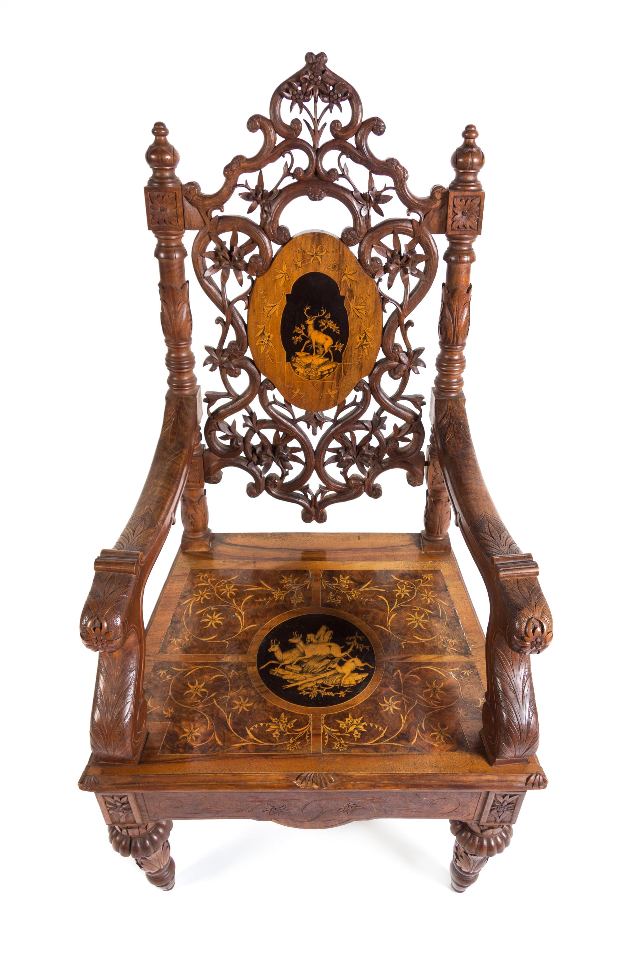 A Black Forest Marquetry Armchair Height 49 3/8 inches. — LATE 19TH CENTURY