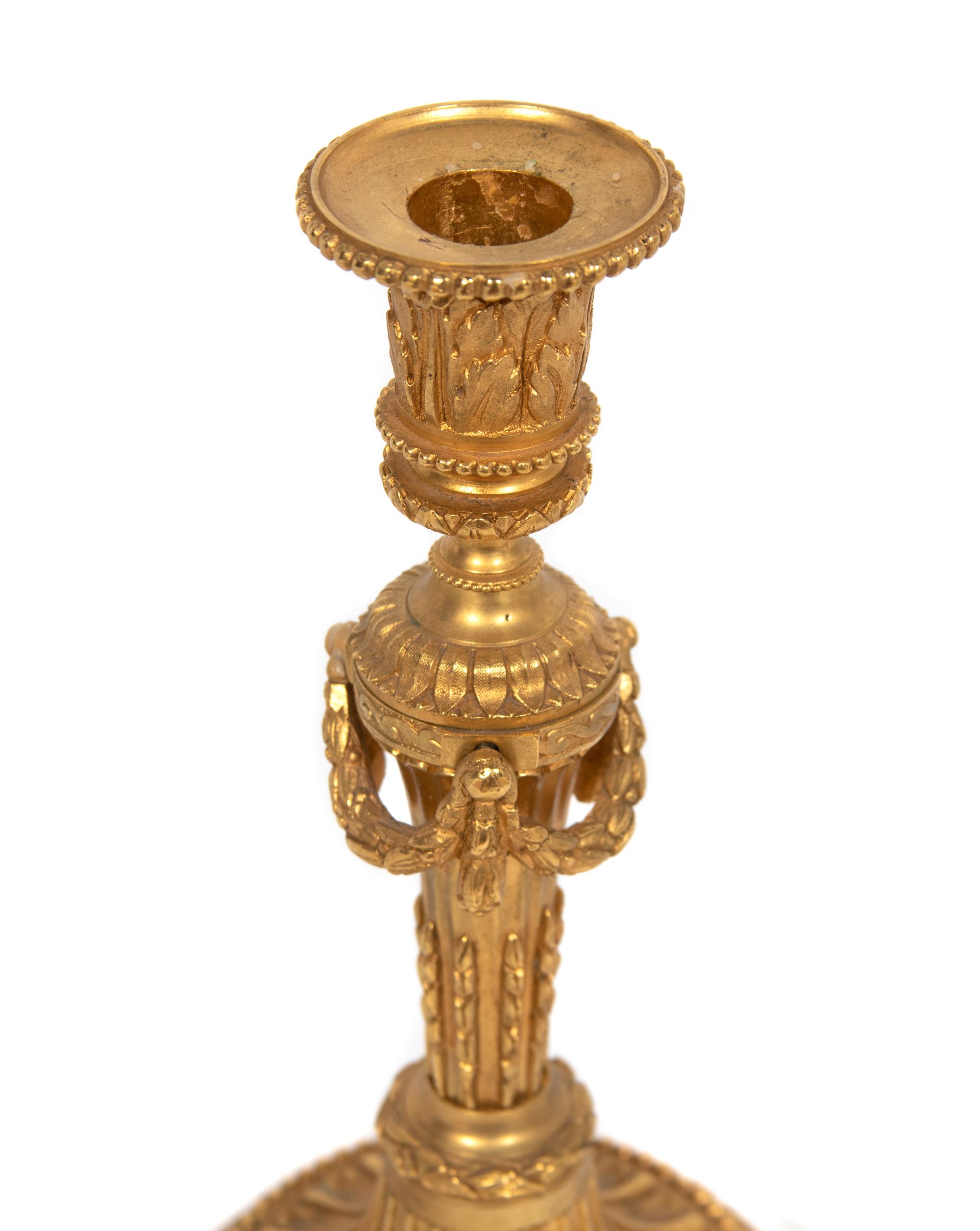 A Pair of Louis XVI Style Gilt-Bronze Candlesticks