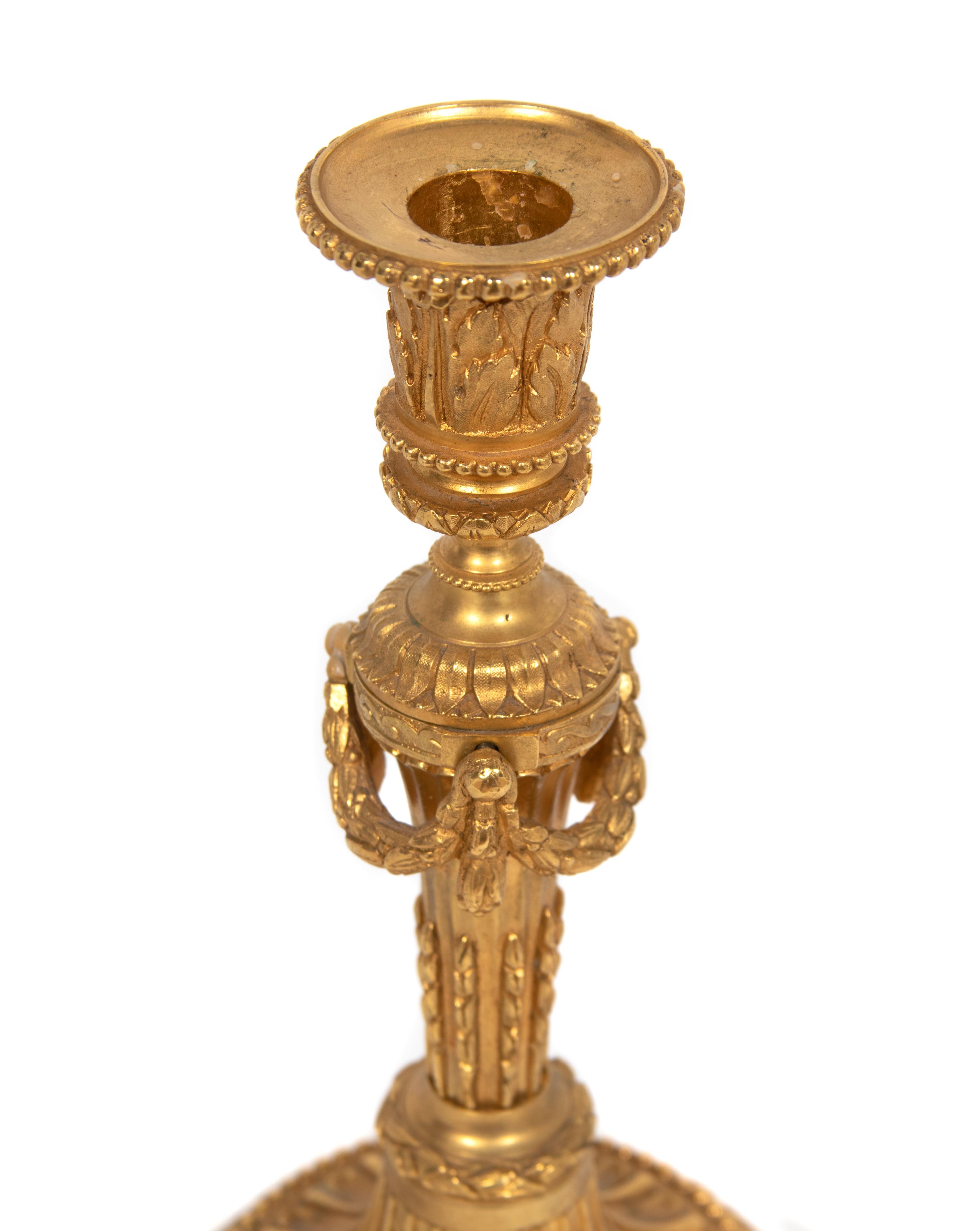 A Pair of Louis XVI Style Gilt-Bronze Candlesticks