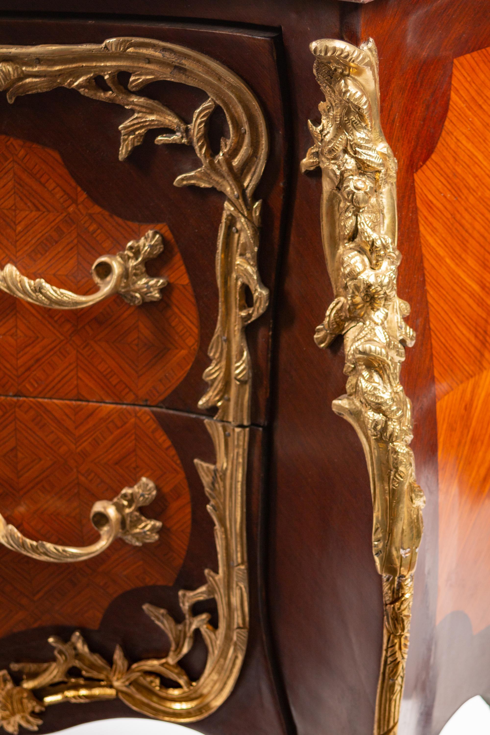 A Pair of Louis XV Style Gilt-Bronze-Mounted Inlaid Kingwood and Tulipwood Commodes