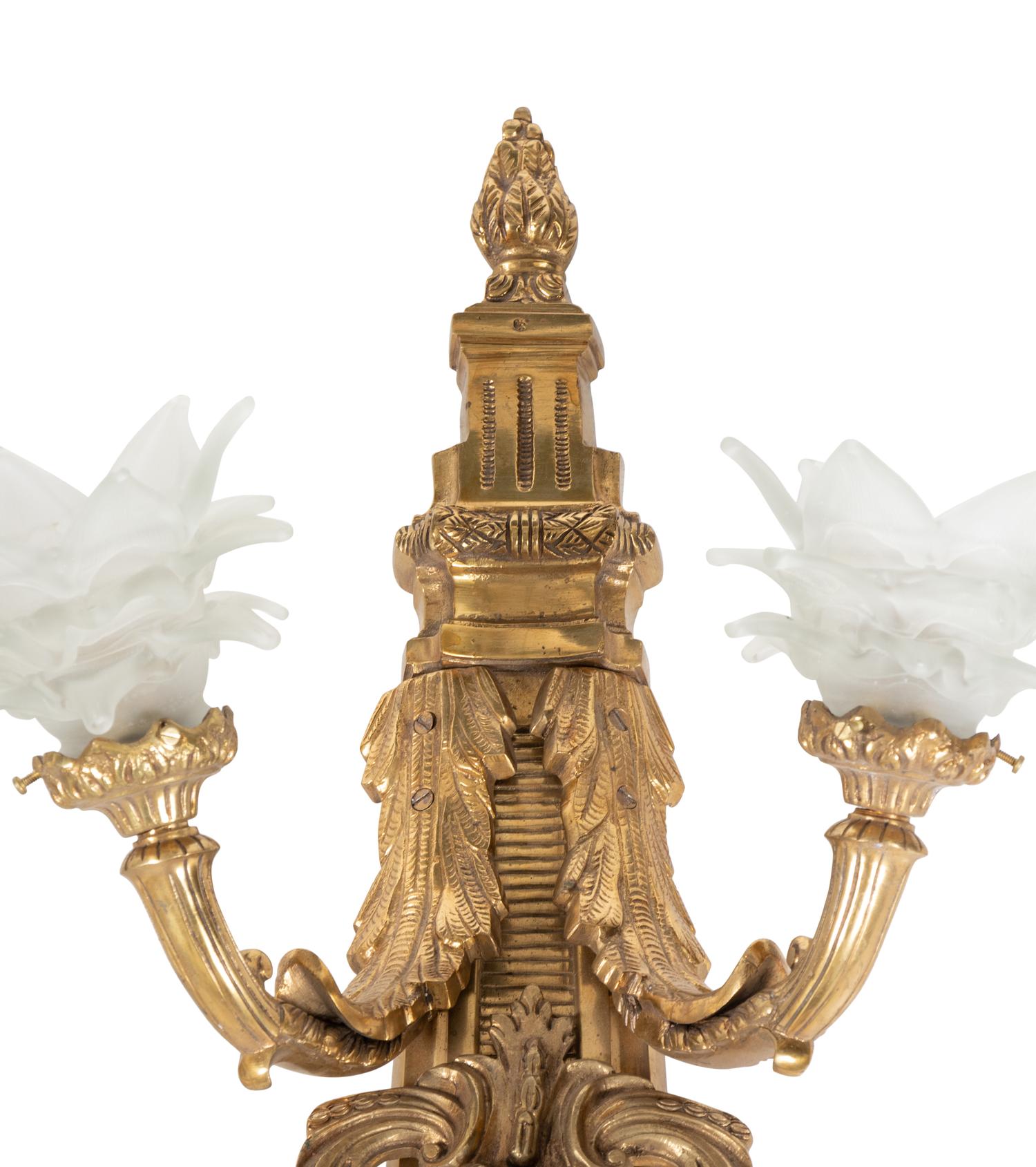 A Pair of Neoclassical Gilt Metal Five-Light Sconces with Frosted Glass Shades