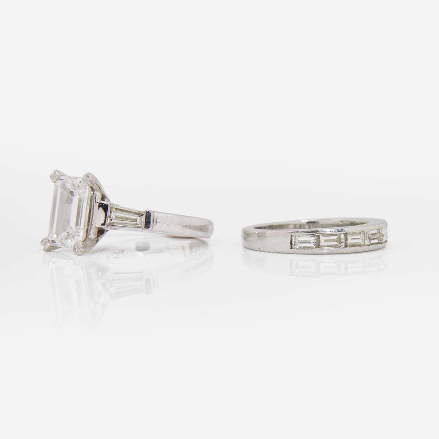 An Emerald-Cut Diamond and Platinum Ring and Band 2.25 Carat Emerald-Cut Diamond, GIA Certified