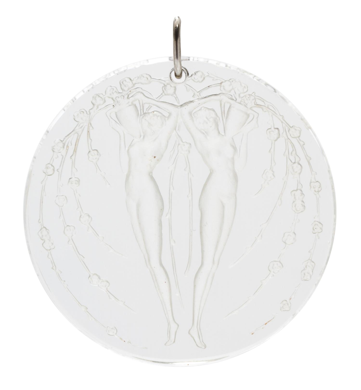 A Molded Glass and Platinum 'Deux Figurines Et Fleurs' Pendant, Rene Lalique,