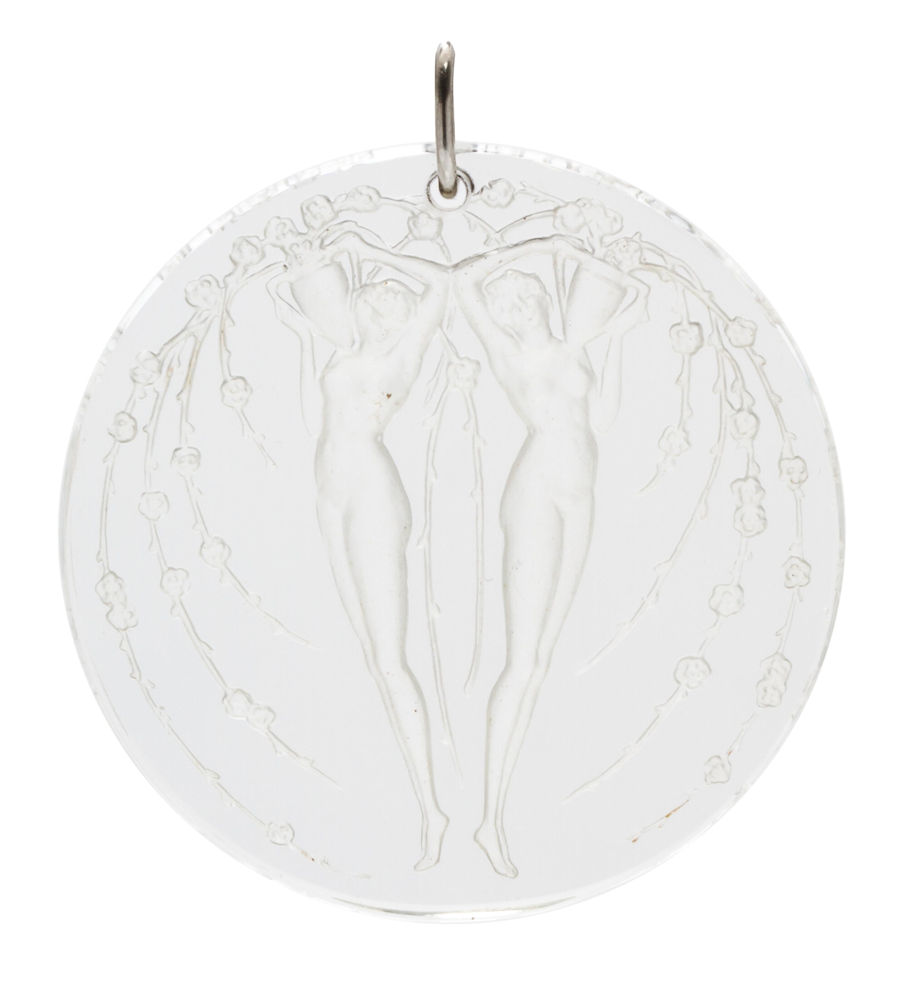 A Molded Glass and Platinum 'Deux Figurines Et Fleurs' Pendant, Rene Lalique,