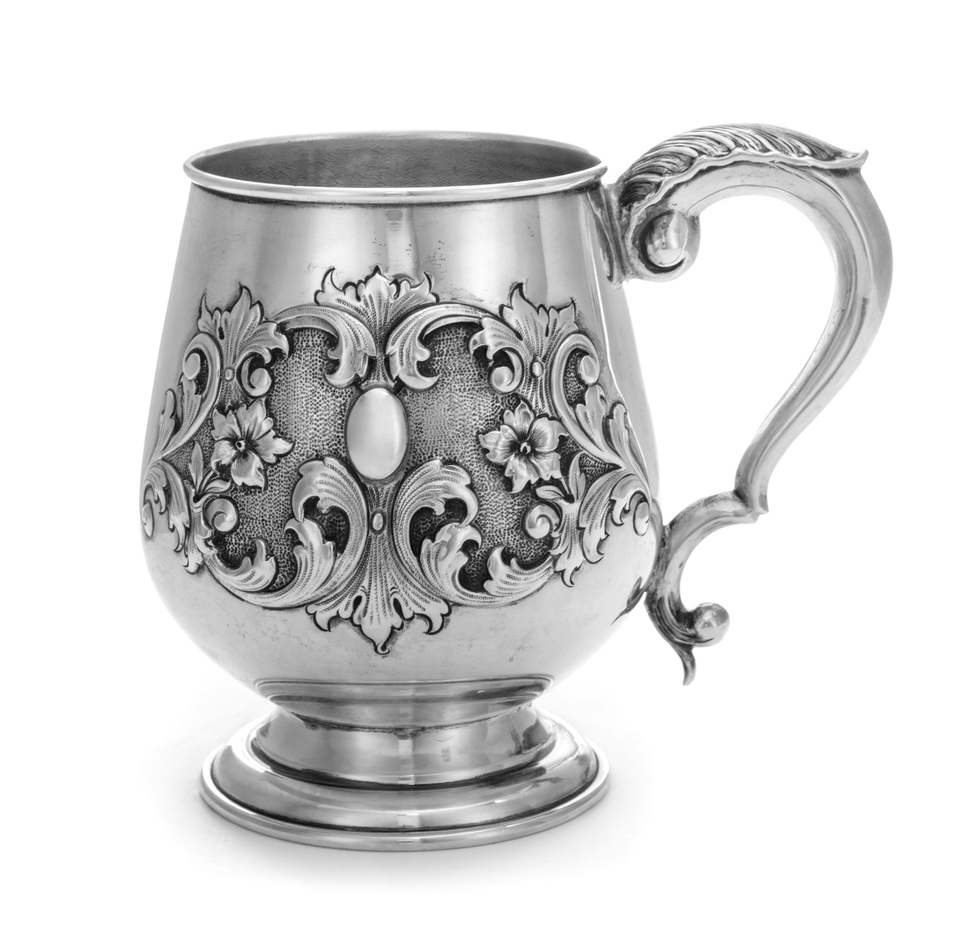 An Italian Silver Handled Cup, , raised on stepped foot, with applied foliate motif on front, and acanthus handle, marked "800" undersi