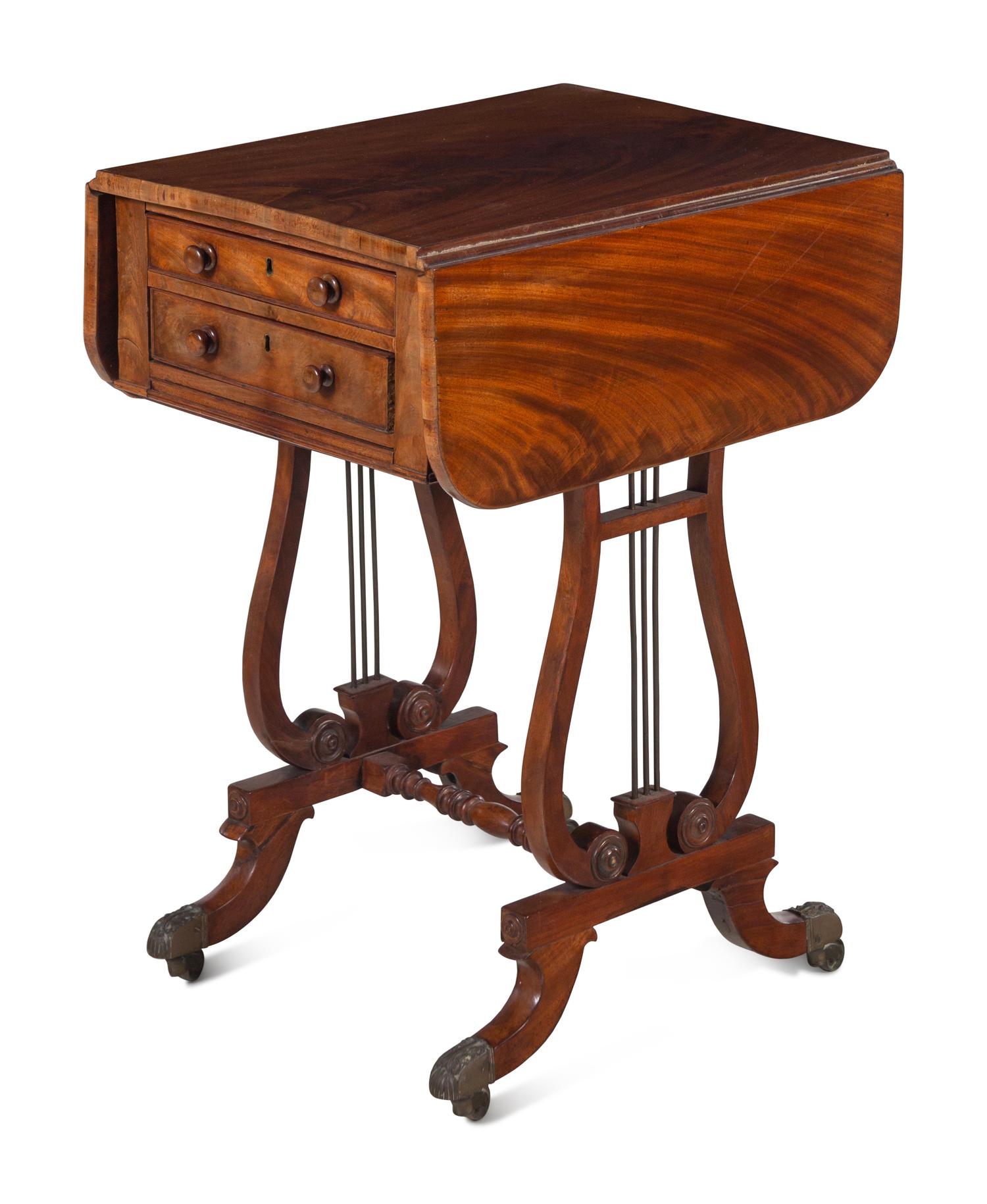 A Regency Style Figured Mahogany Two-Drawer Lyre-Base Work Table