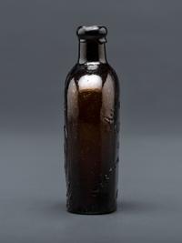A Molded-Glass Flask in Amber by Willington Glass Company, Connecticut