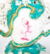 A Continental Porcelain Garniture Set — 19TH CENTURY