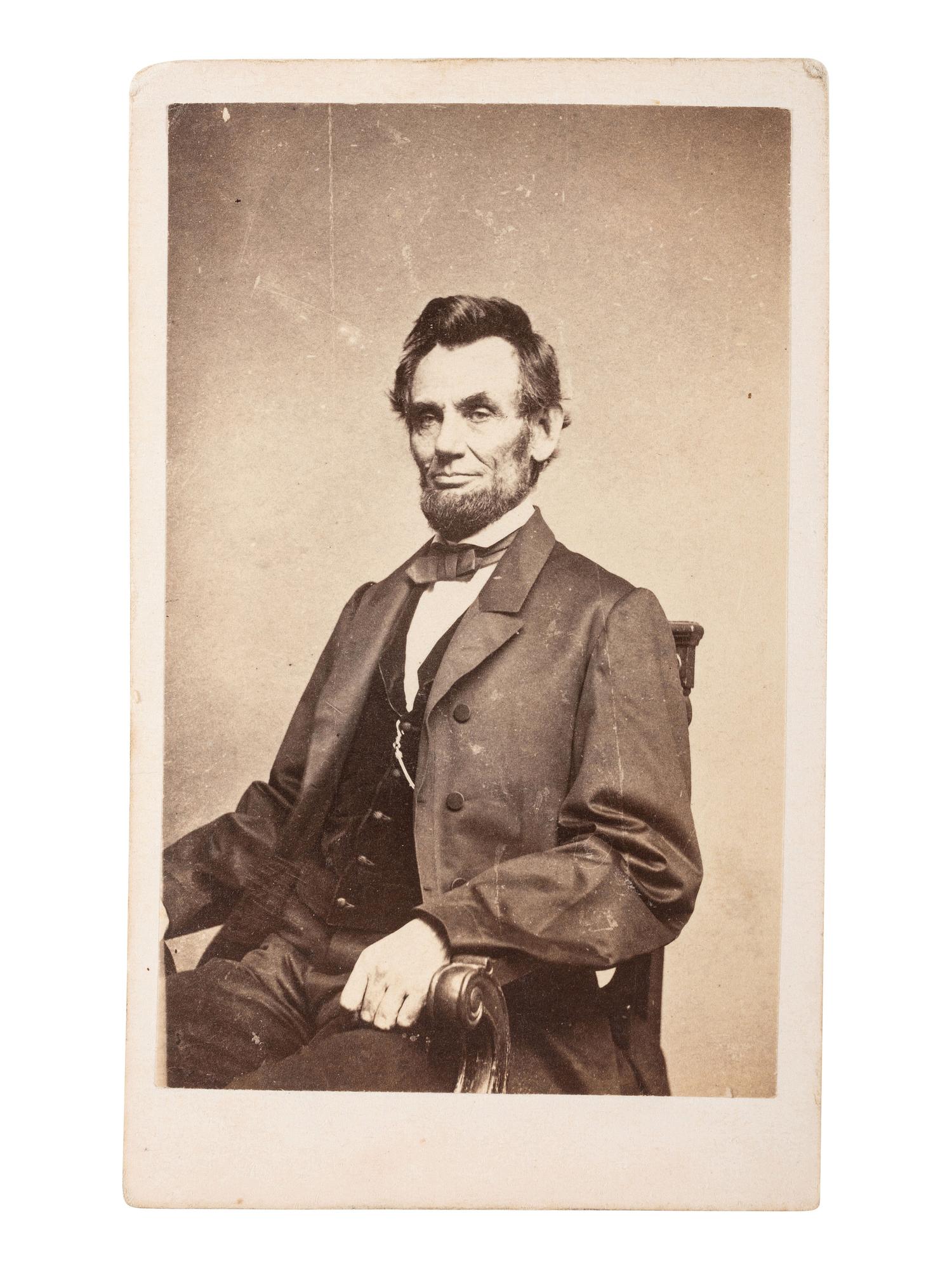 [LINCOLN, Abraham (1809-1865)]. A group of 2 photographs of Abraham Lincoln, incl. CDV by Mathew Brady.
