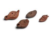 Four Roman Terracotta Oil Lamps