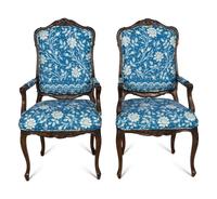 A Pair of Louis XV Style Walnut Fauteuils