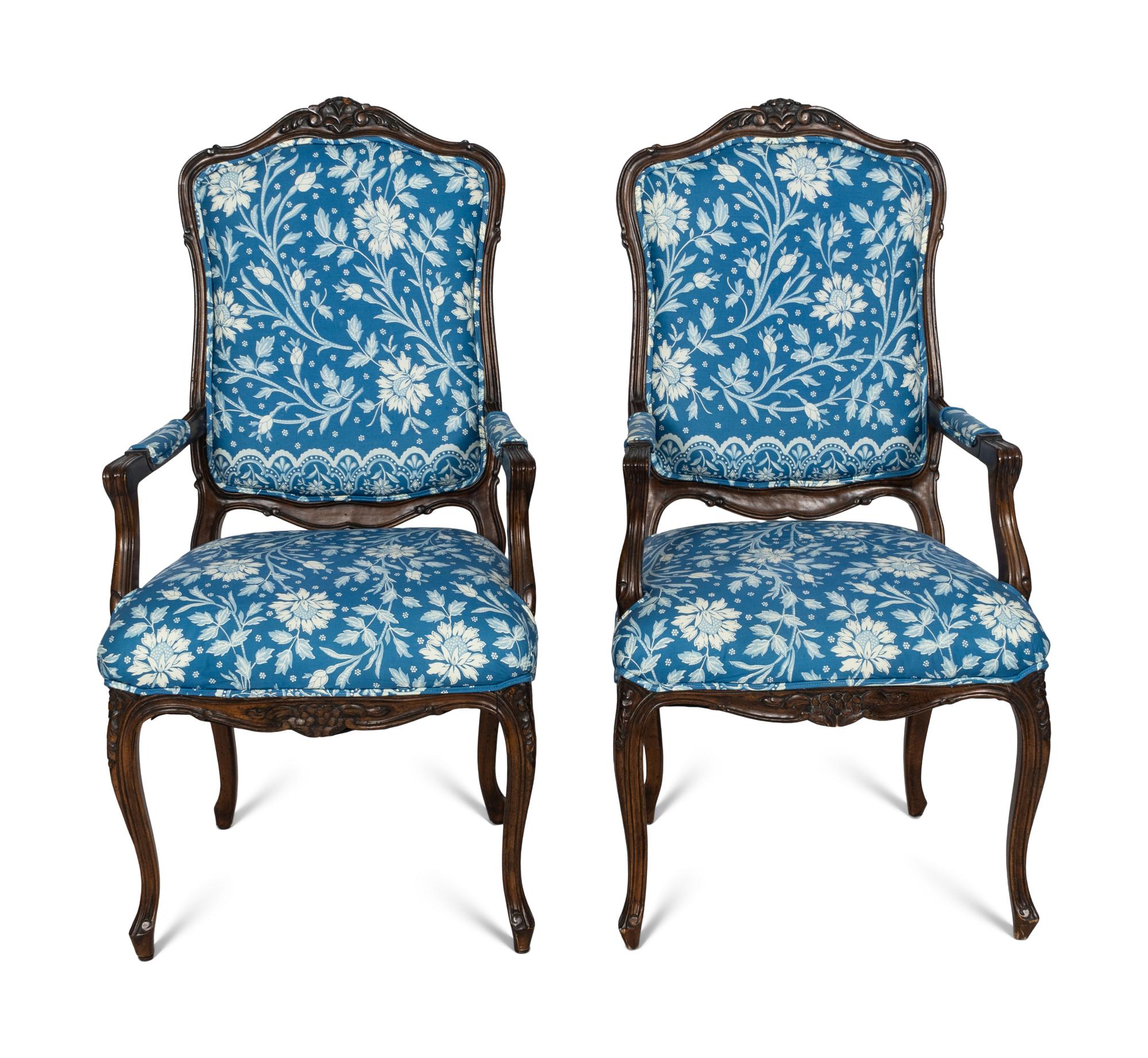 A Pair of Louis XV Style Walnut Fauteuils
