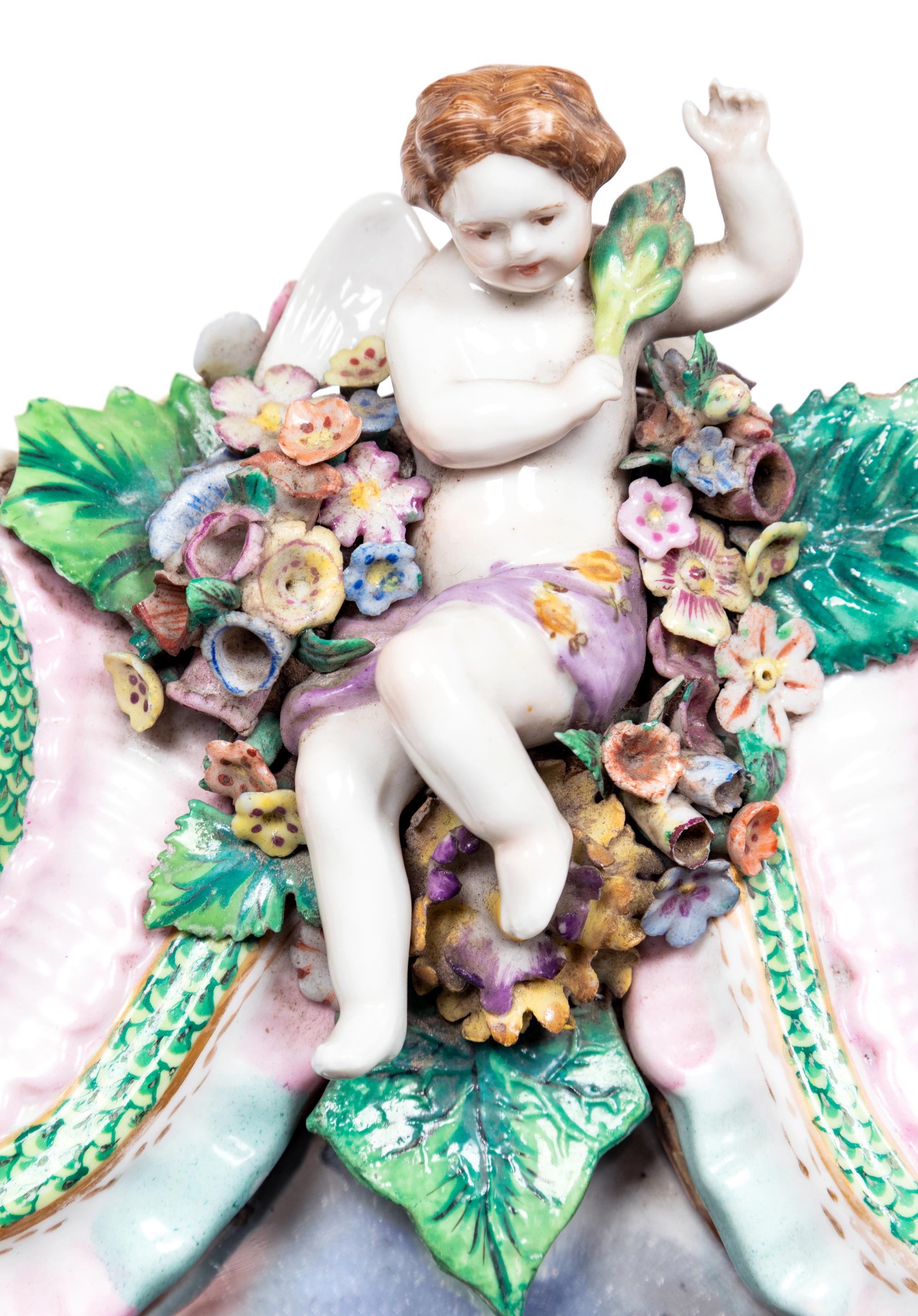 A Pair of Continental Porcelain Girandole Mirrors