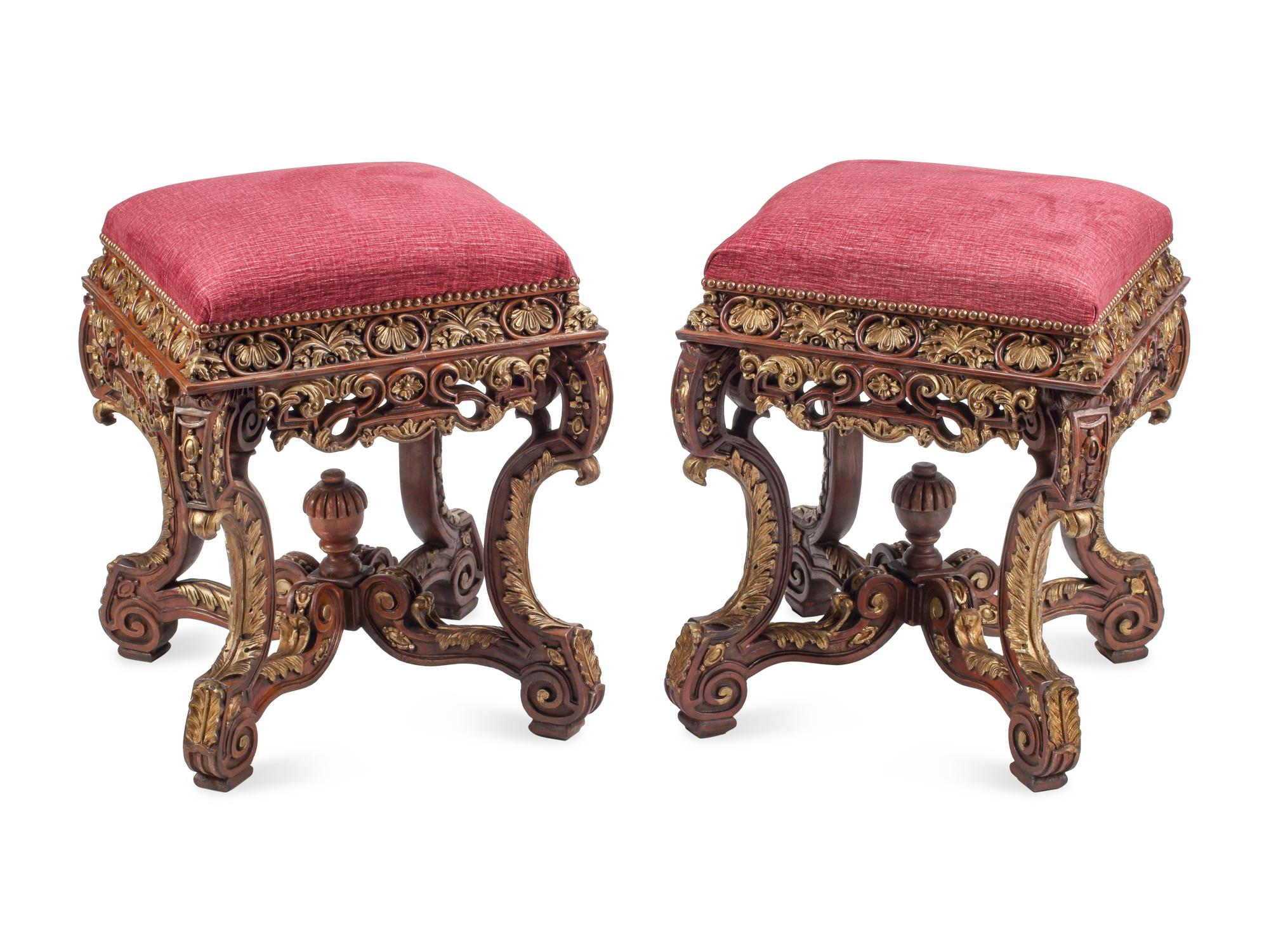 A Pair of Régence Style Carved and Parcel Gilt Stools