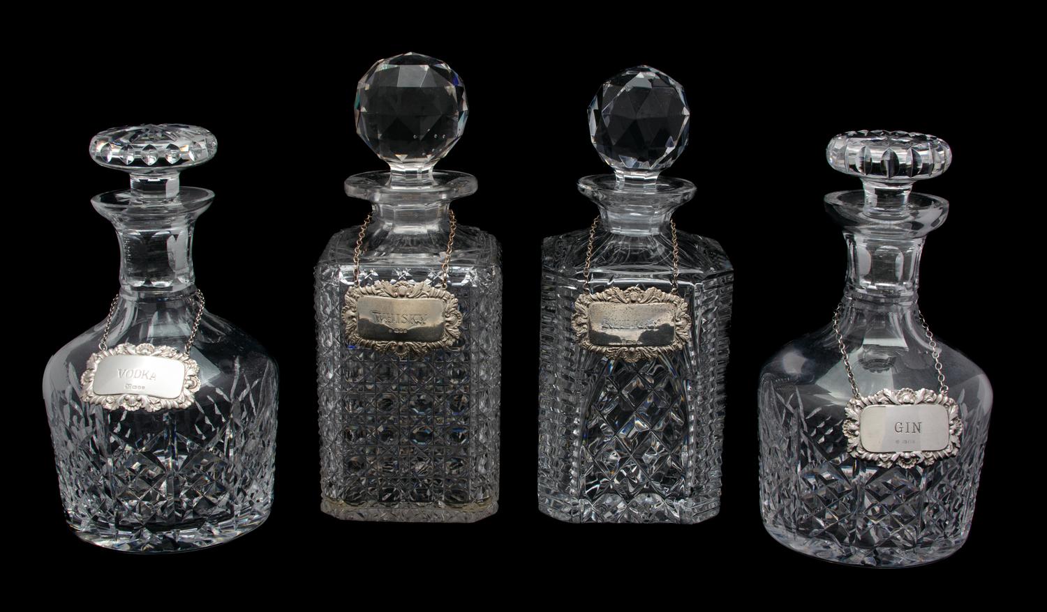 Four Cut Glass Decanters with English Silver Labels Height of tallest 10 inches. — 20TH CENTURY