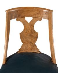 A Set of Six German or Austrian Walnut Dining Chairs