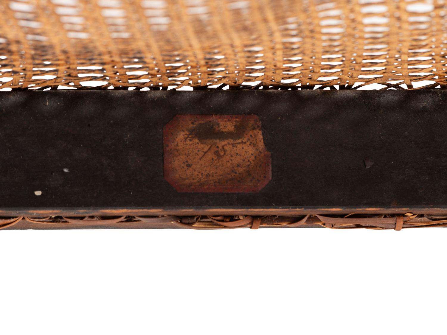 A Classical Black and Gilt Decorated Cane-Upholstered Armchair
