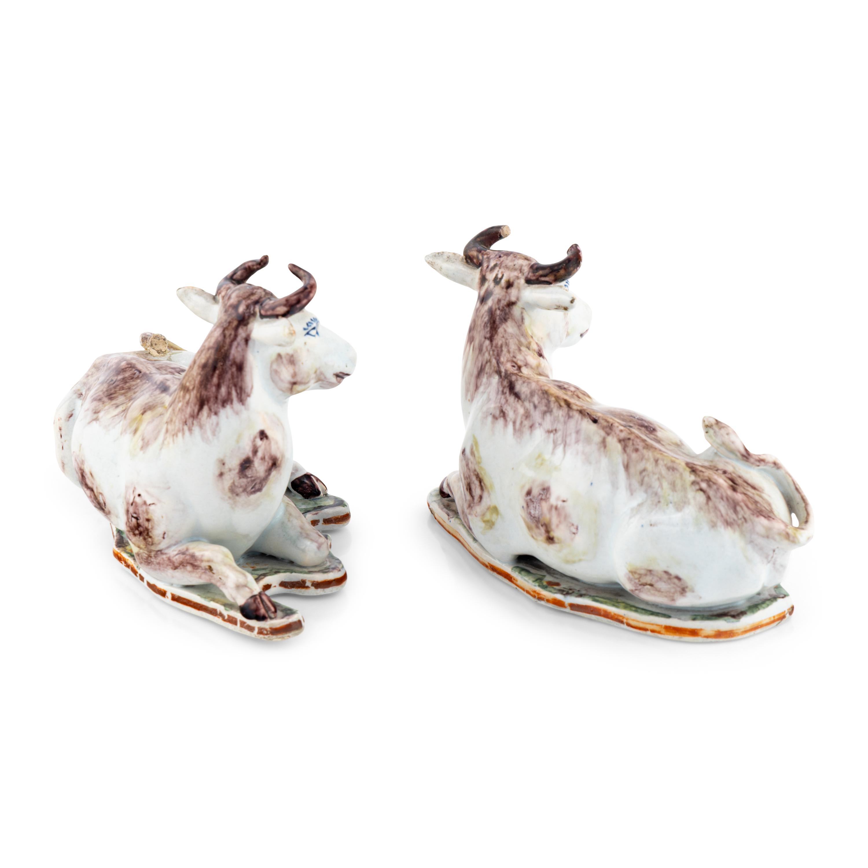 A Pair of Delftware Recumbent Bulls