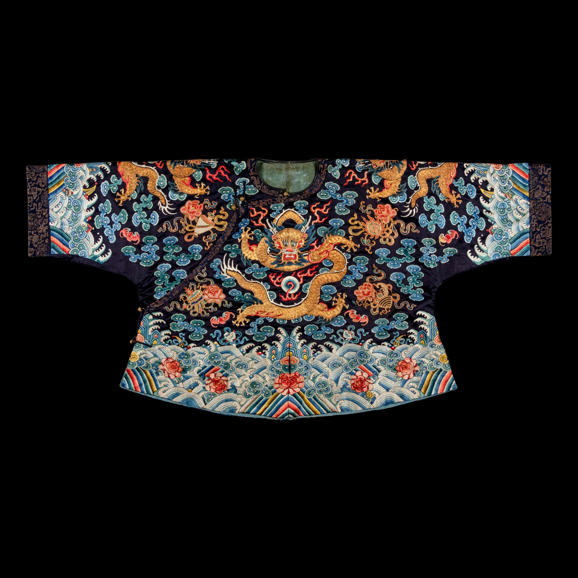 A Chinese Black Ground Embroidered Silk 'Dragon' Court Robe, Chaofugua, 19th Century 清晚期 黑緞地綉云龍紋朝服褂