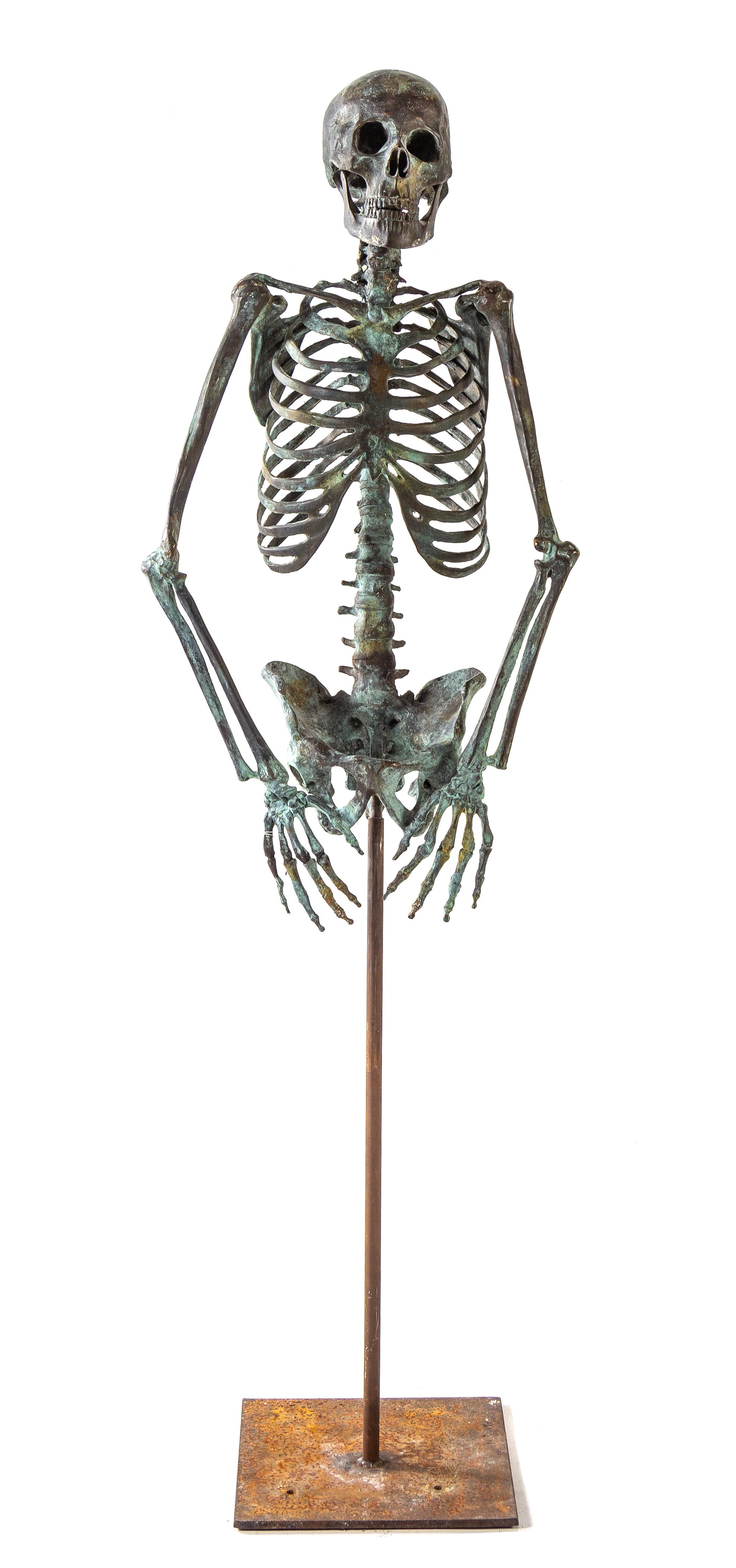 A Bronze Skeleton Figure Height overall 58 1/2 inches. — 20TH CENTURY