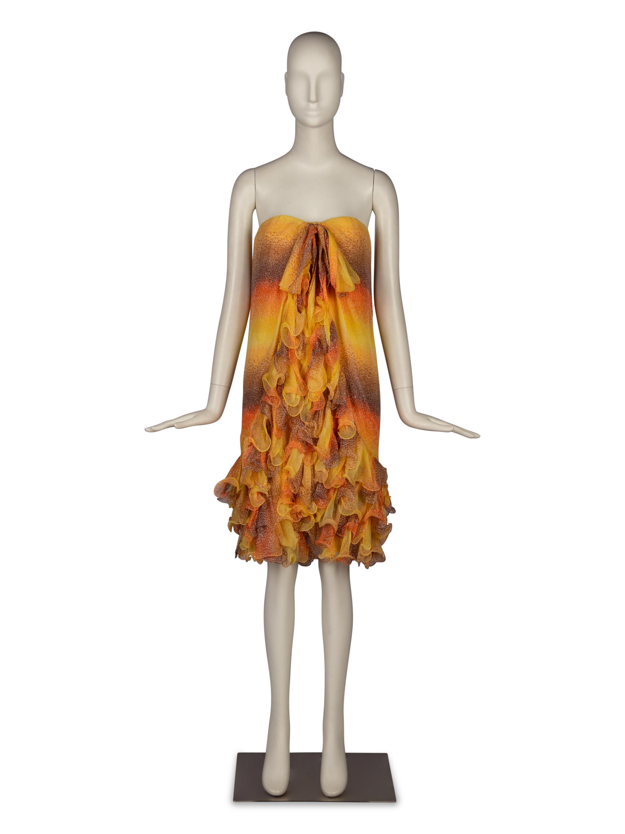 A Group of Two Skirts by Valentino and Bill Blass Dress