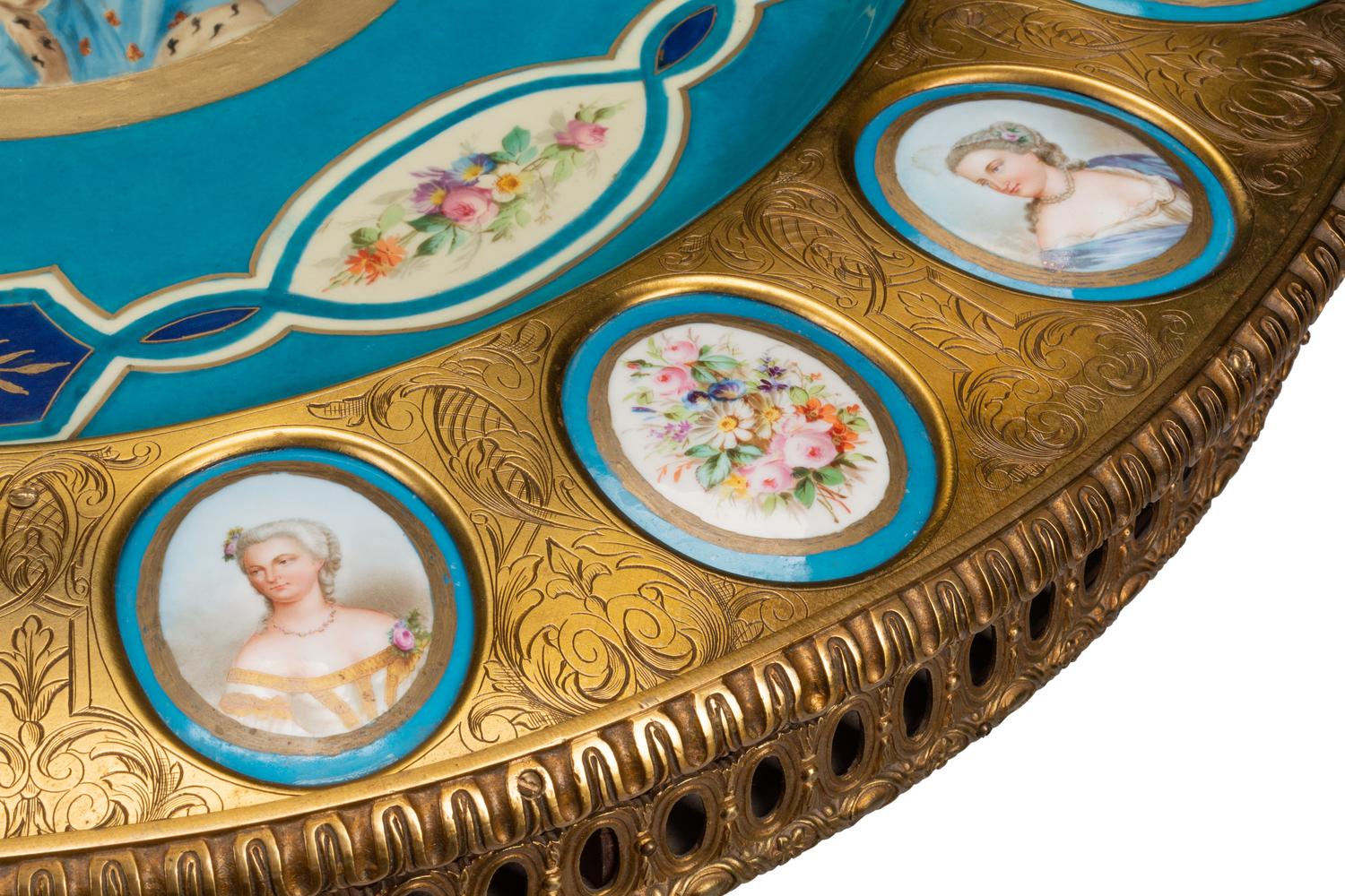 A Louis XVI Style Gilt Bronze and Porcelain Mounted Guéridon