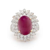 CABOCHON RUBY, DIAMOND, AND BICOLOR GOLD RING