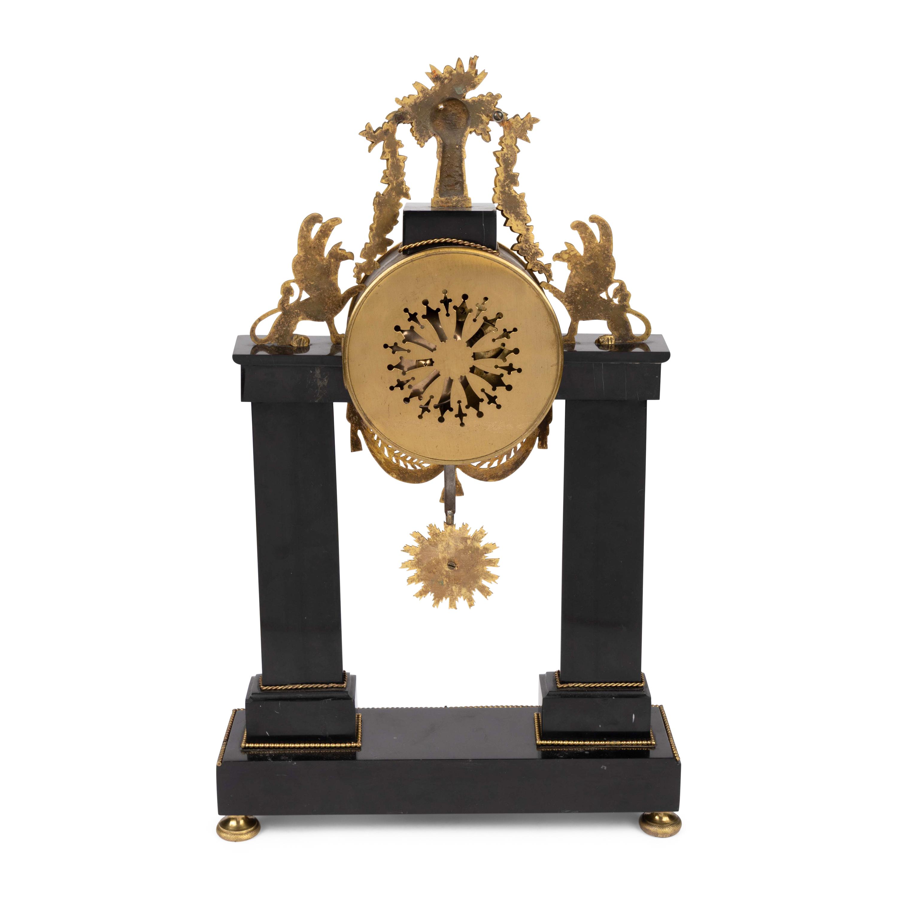 An Empire Patinated and Gilt Bronze Mantel Clock