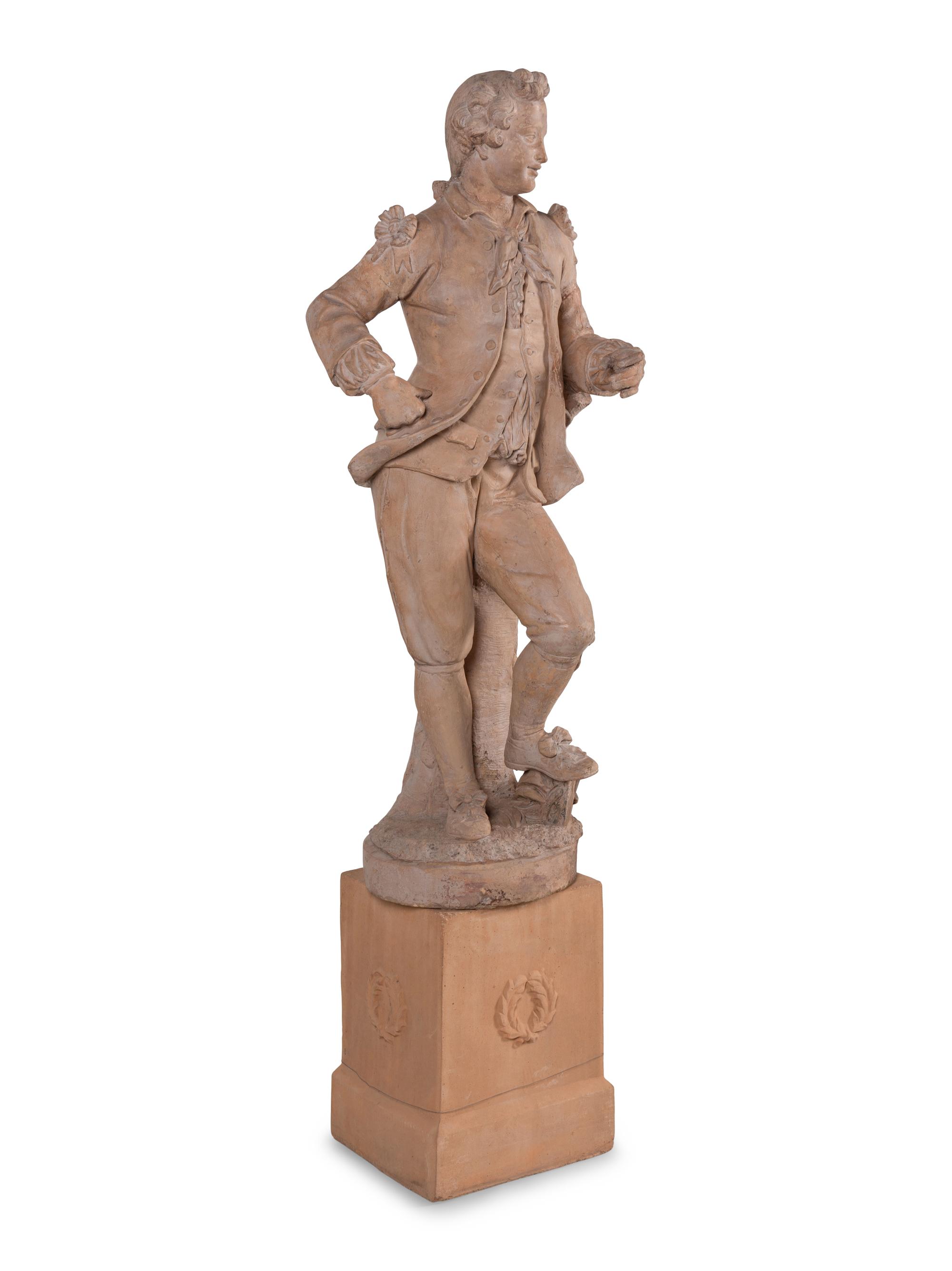 A Continental Terra Cotta Figure