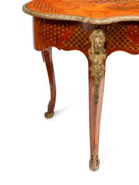 A Napoleon III Style Gilt Bronze Mounted Marquetry Center Table