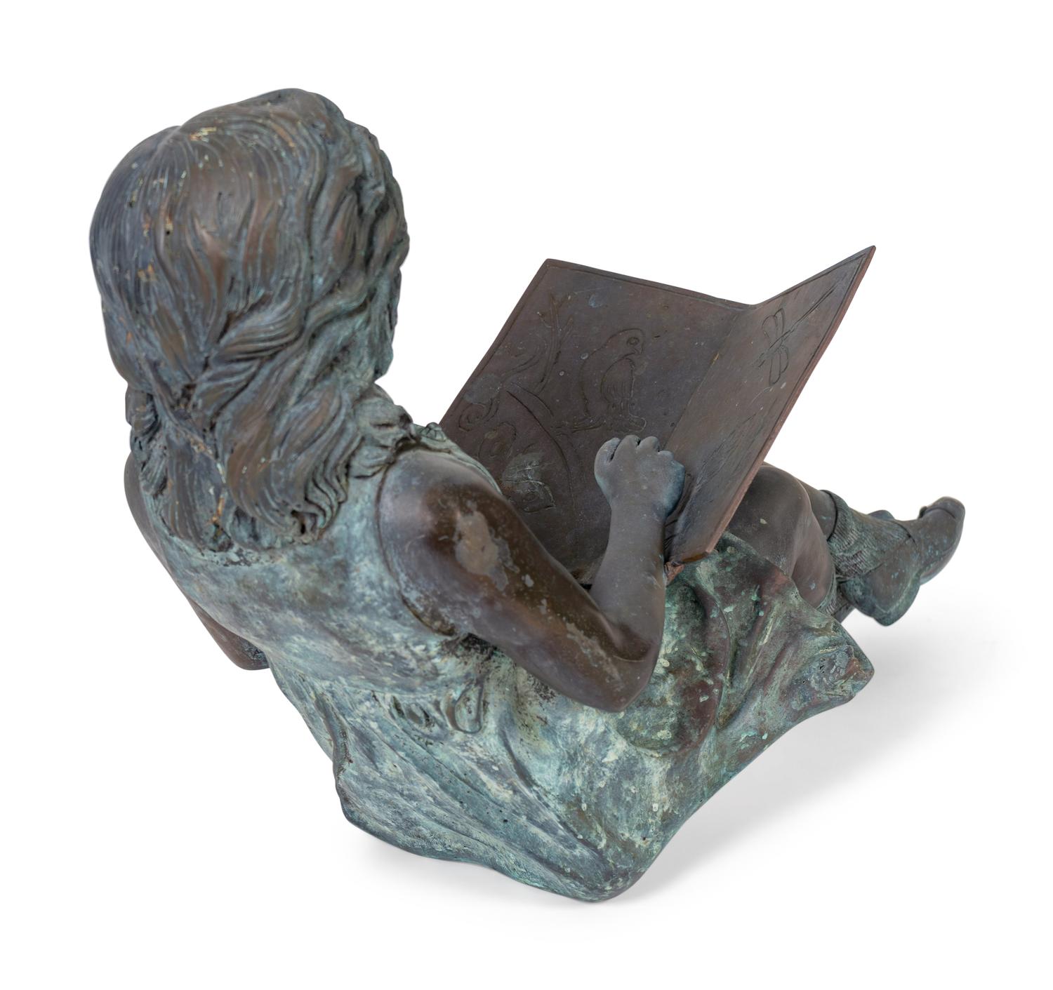 A Bronze Figure of a Young Girl Reading a Book — 20TH CENTURY