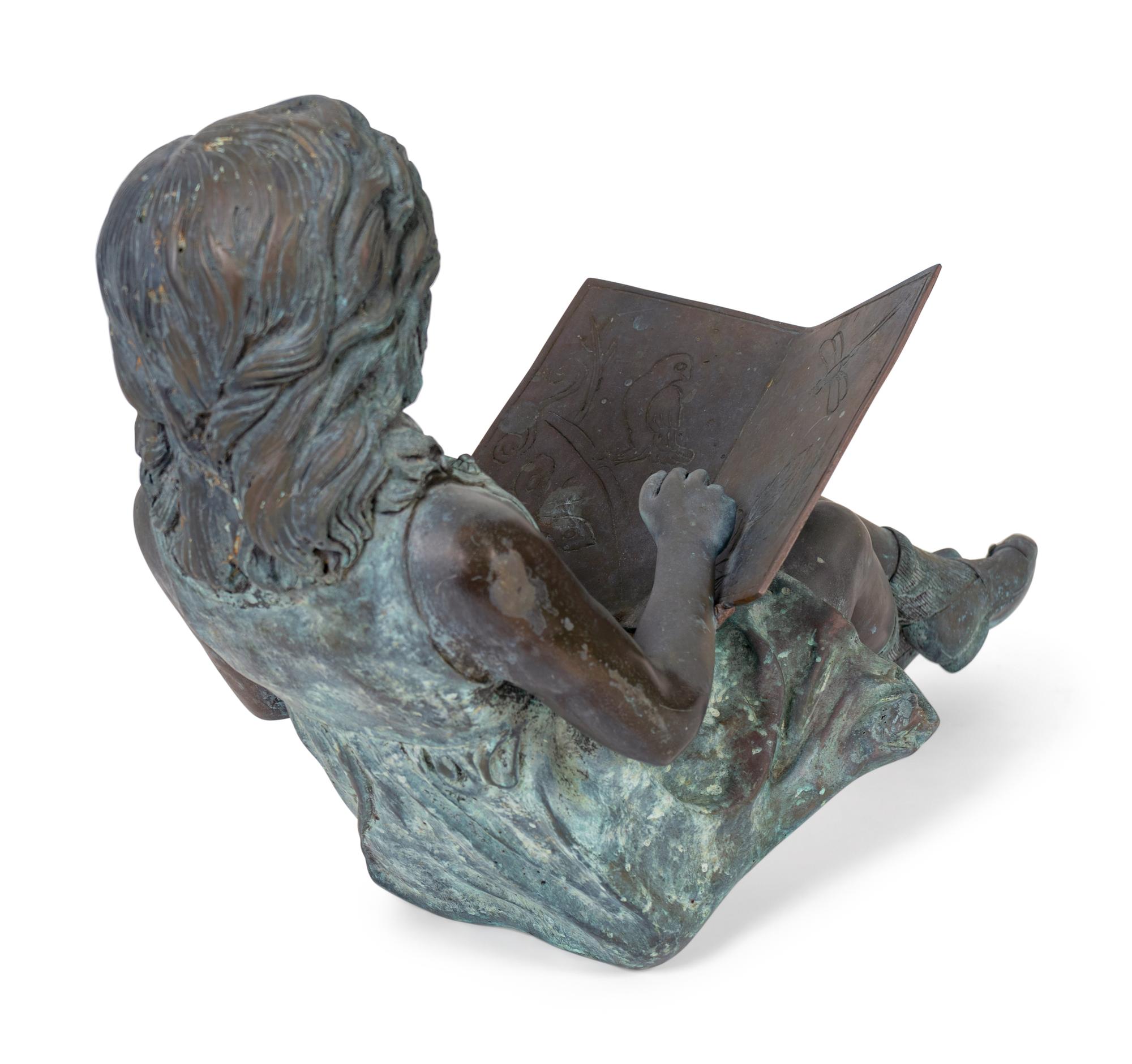 A Bronze Figure of a Young Girl Reading a Book — 20TH CENTURY