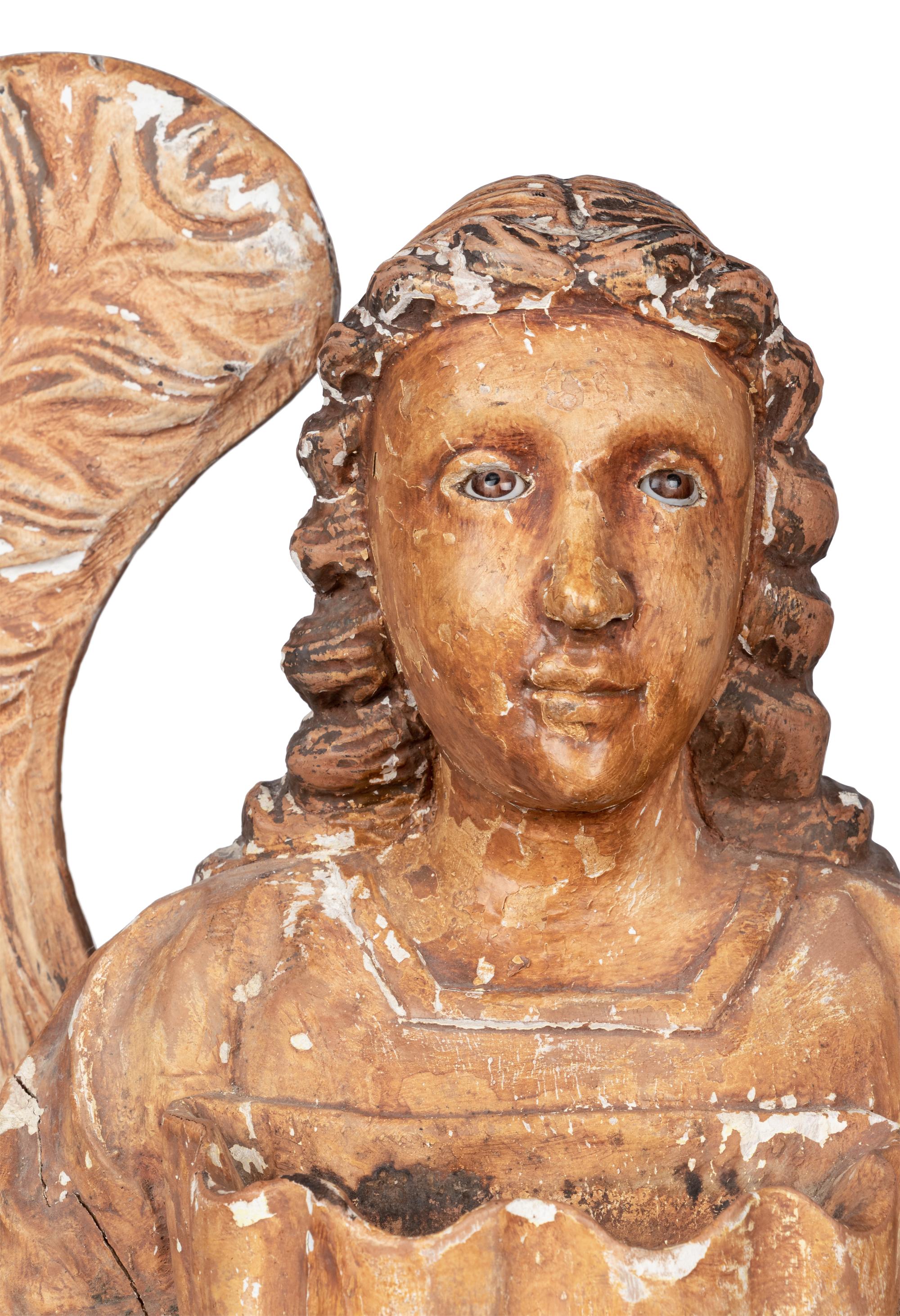 A Cast Plaster Winged Angel Sculpture