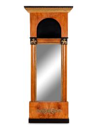 A Biedermeier Parcel Ebonized and Gilt Metal Mounted Mirror