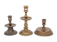 A Group of Three Dutch Brass Candlesticks