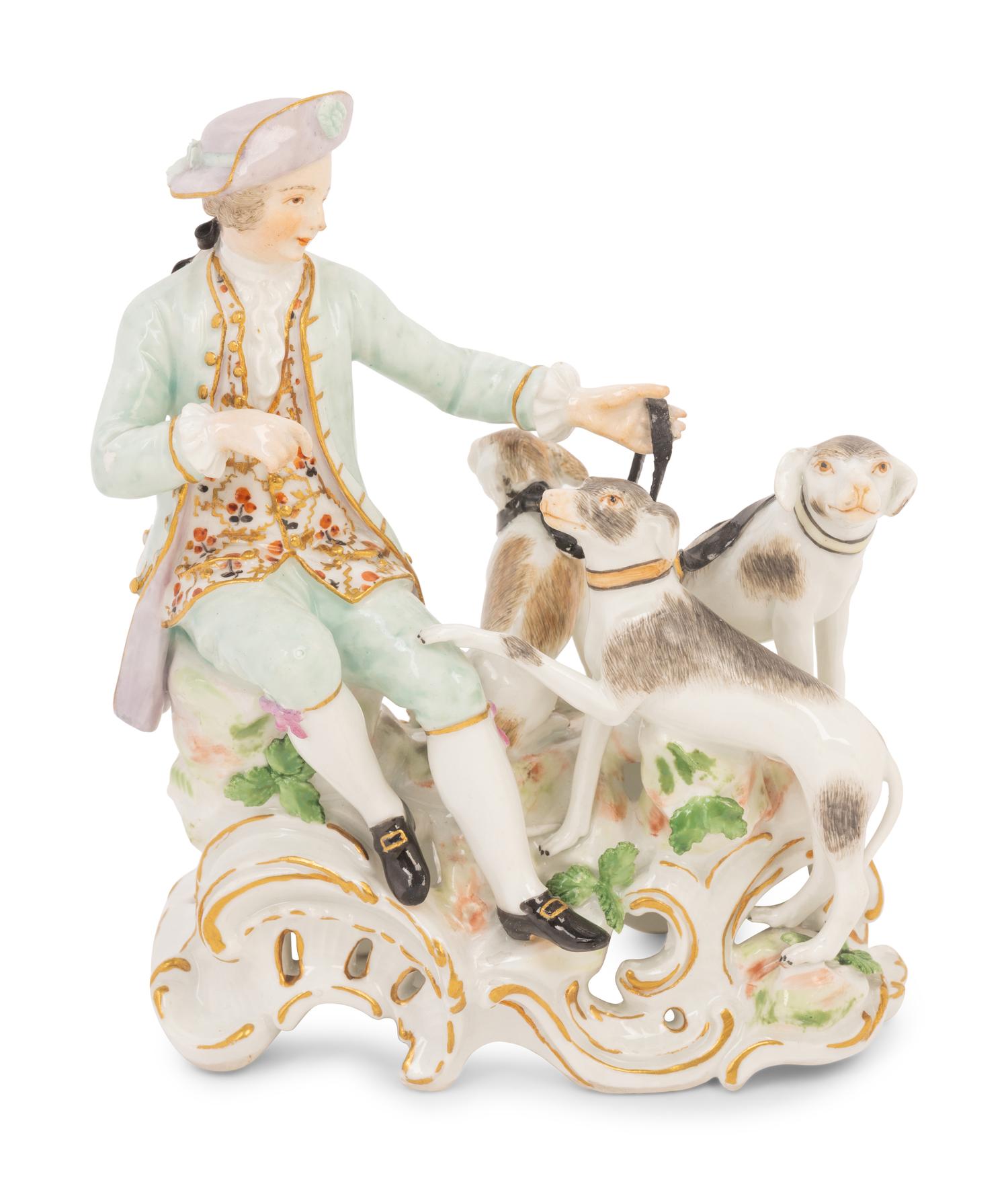 A Meissen Porcelain Figural Group of a Man with Hounds
