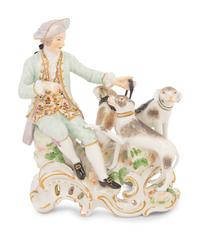 A Meissen Porcelain Figural Group of a Man with Hounds