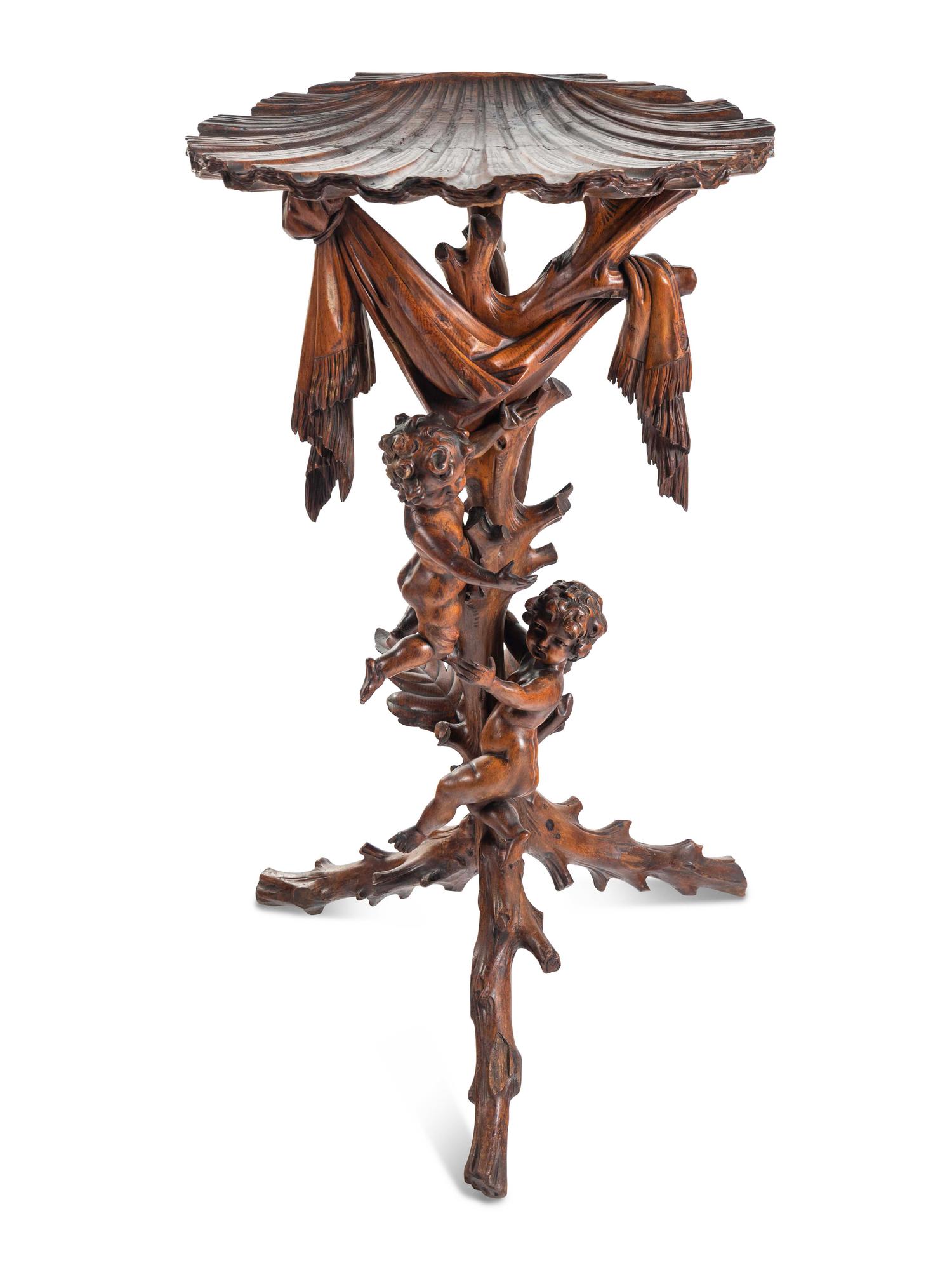 A Venetian Carved Walnut Figural Pedestal