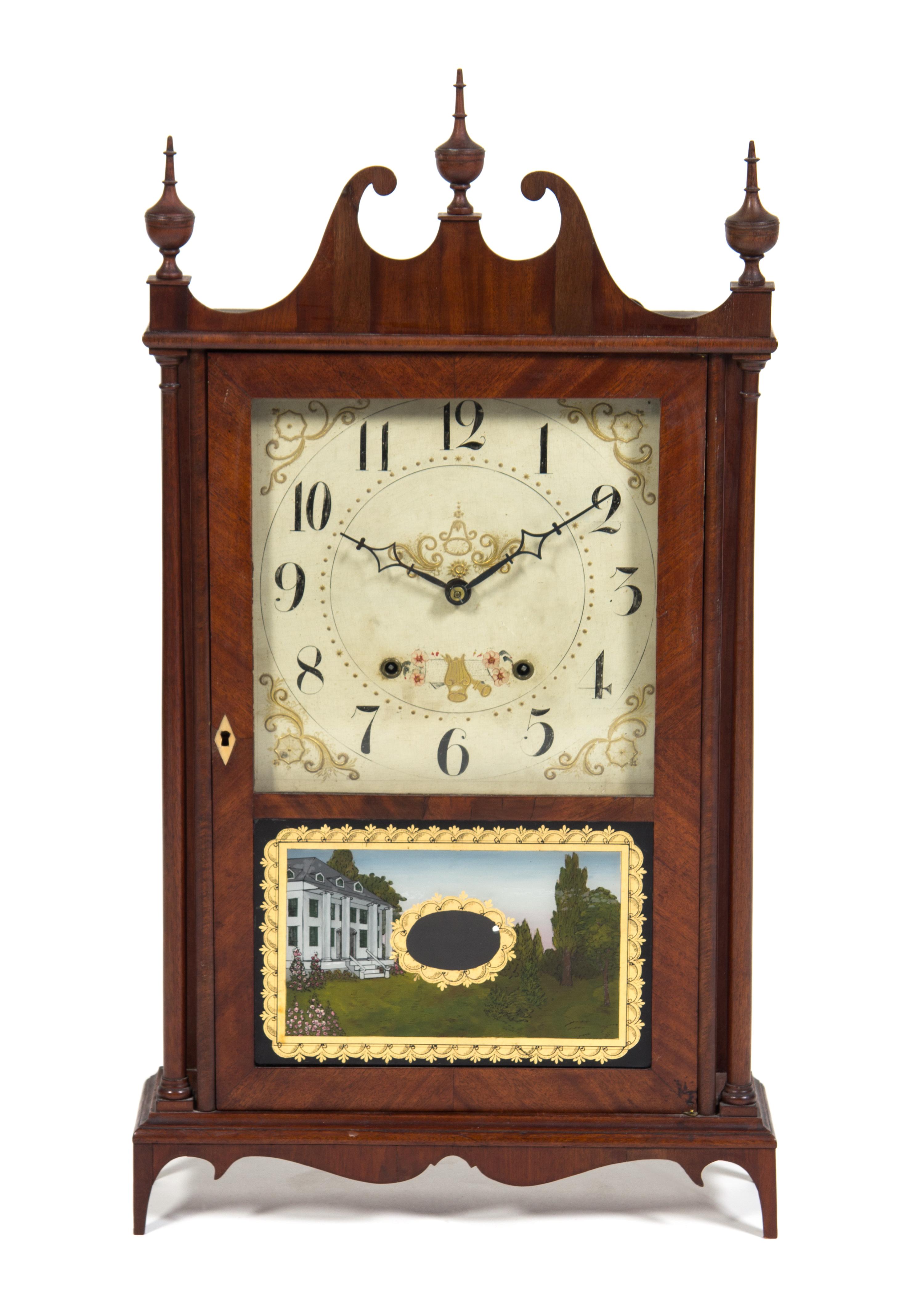 An American Mahogany Pillar and Scroll Clock Height 31 1/2 inches.