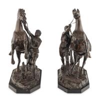 A Pair of French Bronze Models of Marly Horses