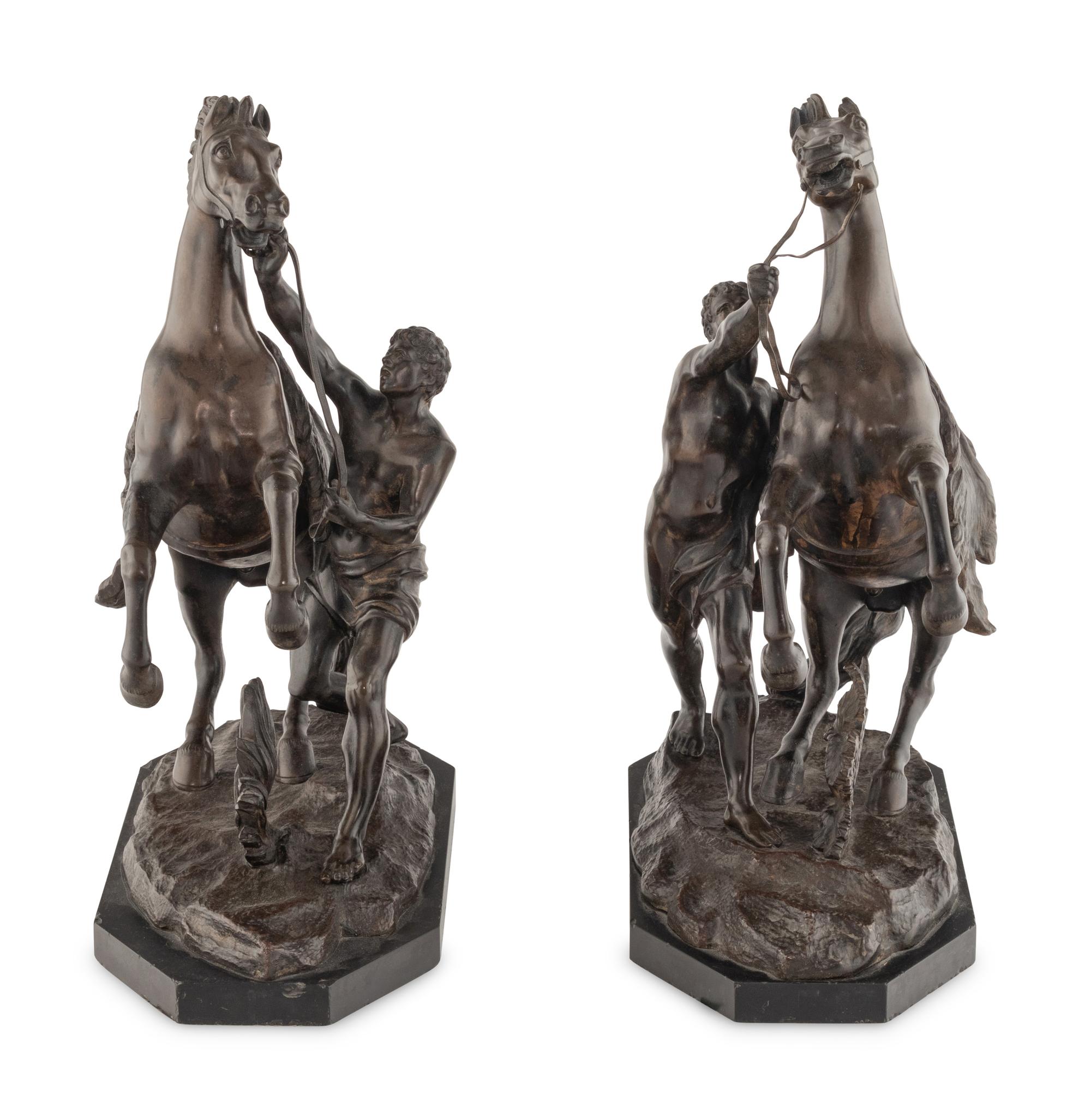 A Pair of French Bronze Models of Marly Horses