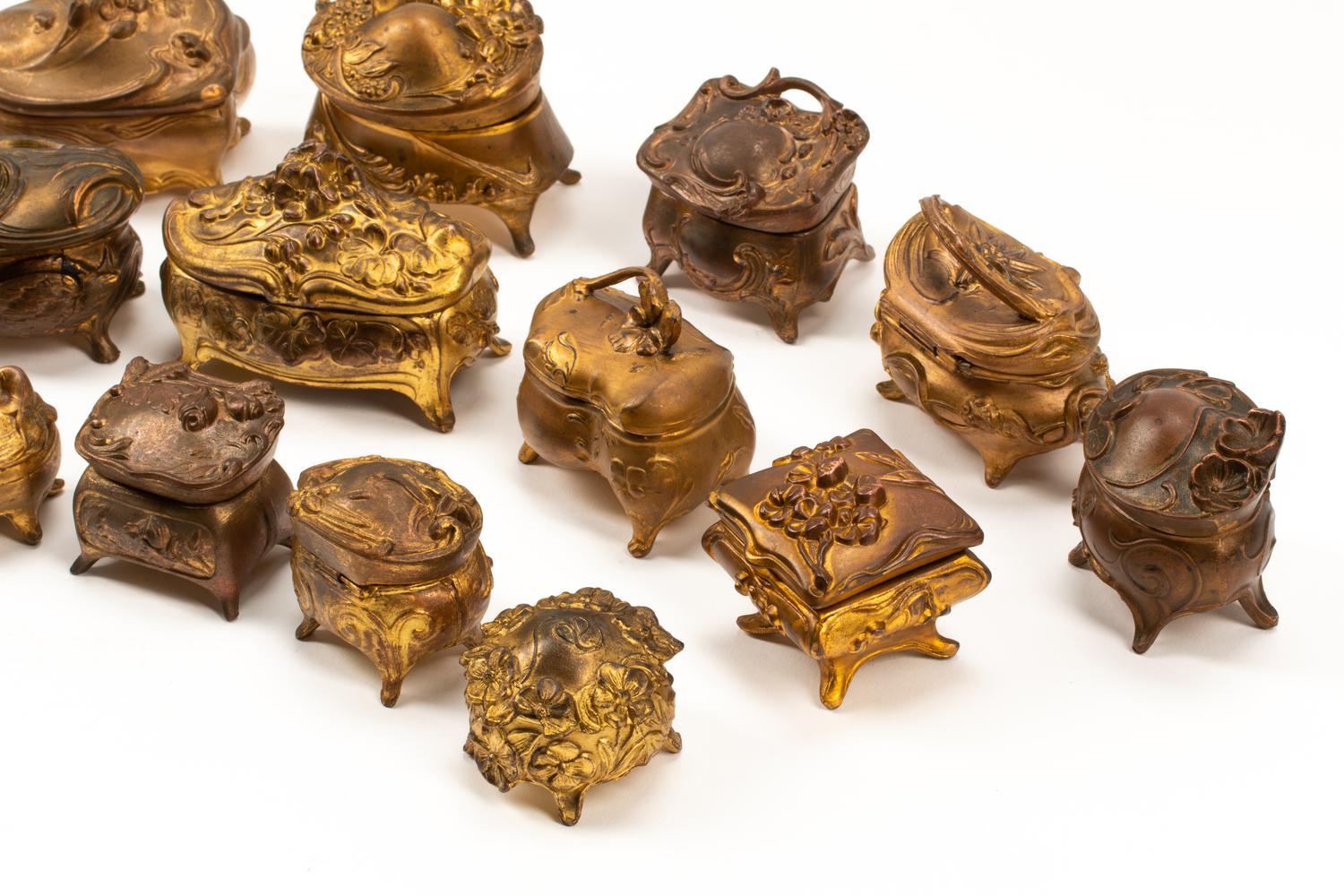 A Collection of Sixteen French Bronze and Metal Small Boxes