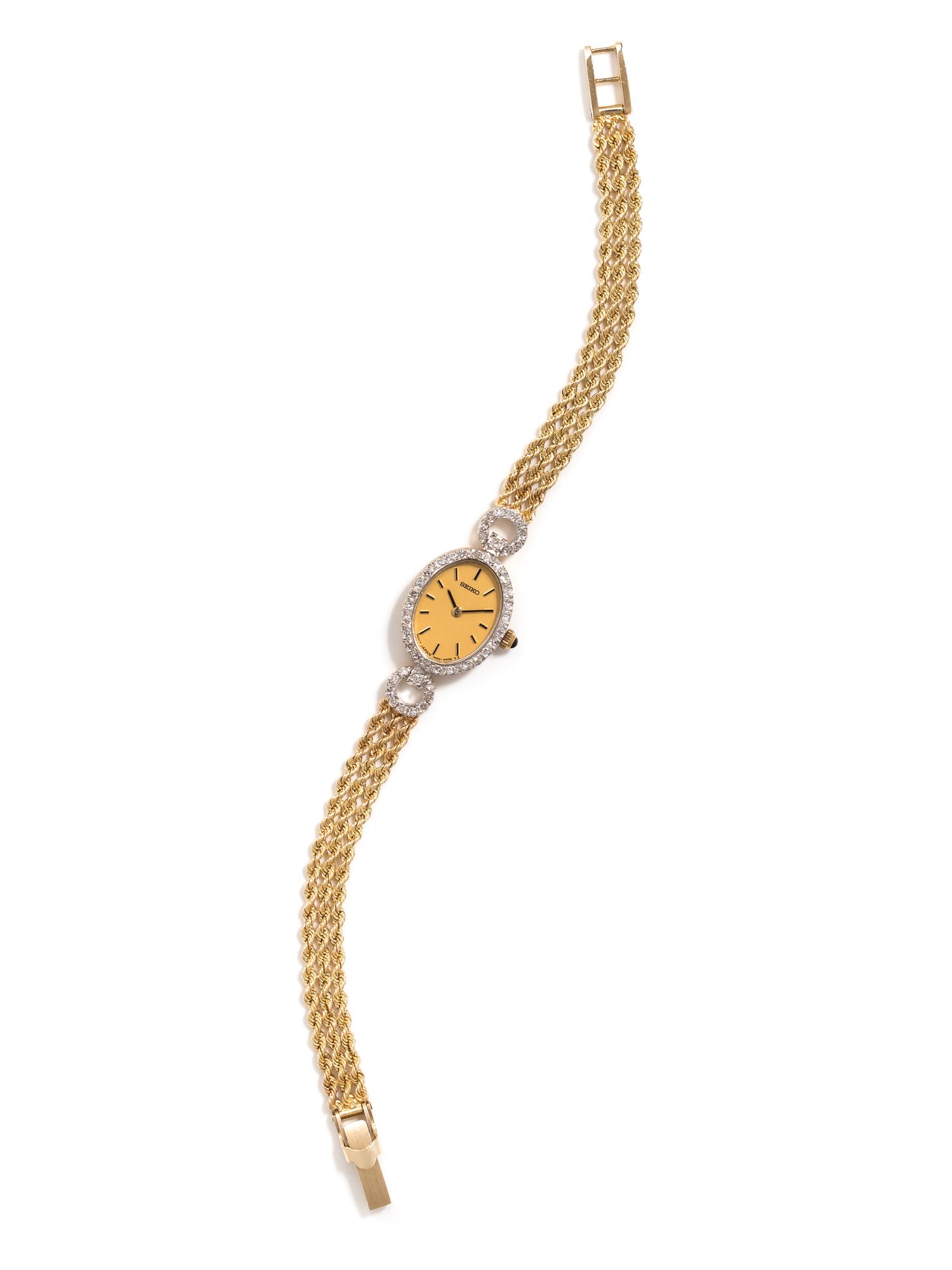 SEIKO, 14K YELLOW GOLD AND DIAMOND WRISTWATCH