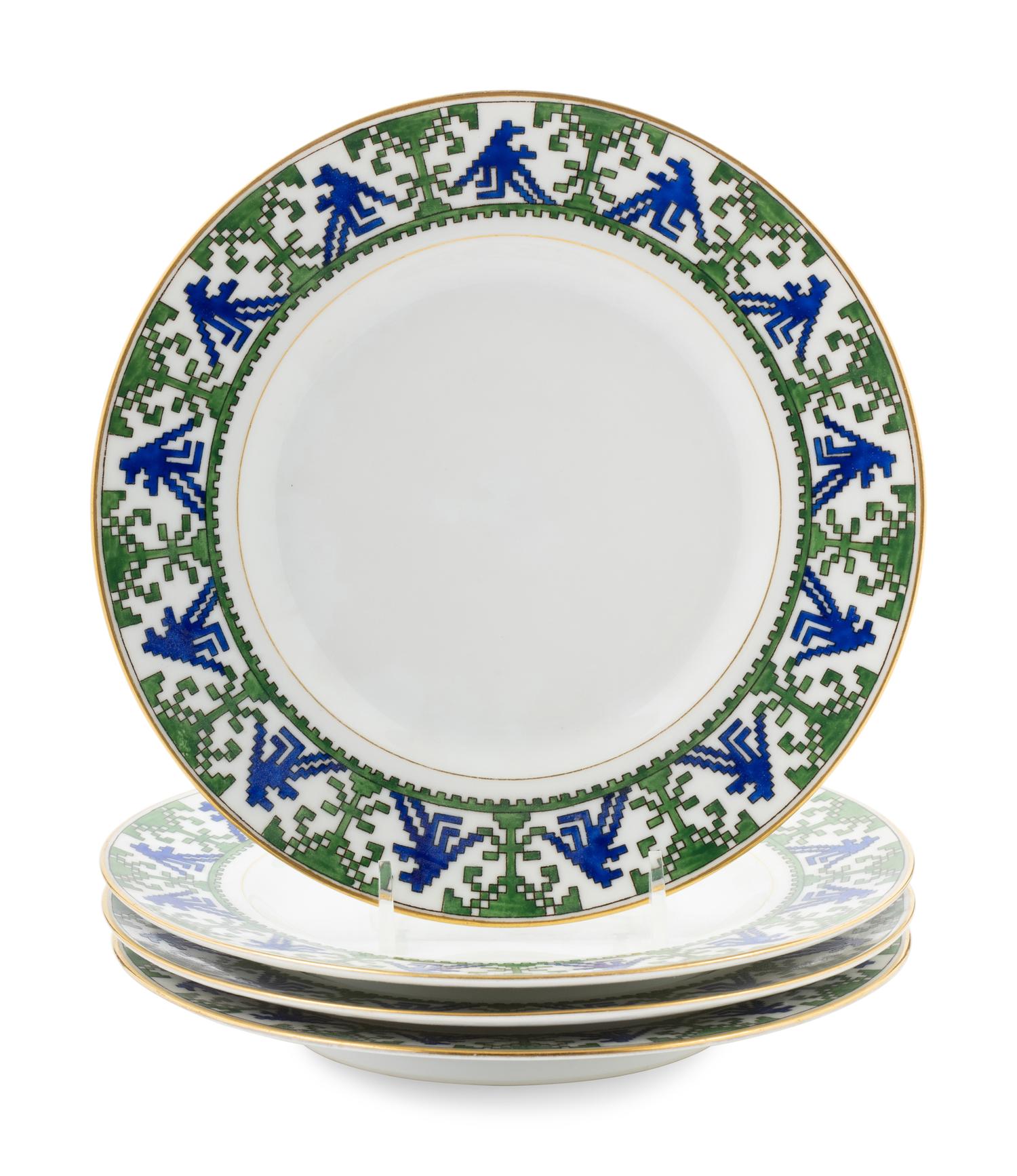 A Set of Four of Kornilov Bros. Porcelain Dessert Plates