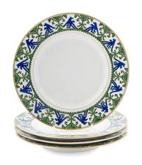 A Set of Four of Kornilov Bros. Porcelain Dessert Plates