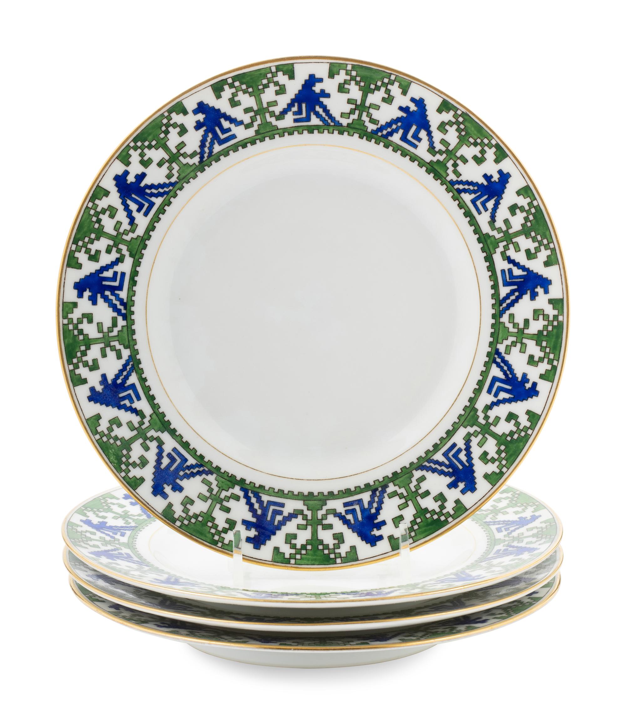 A Set of Four of Kornilov Bros. Porcelain Dessert Plates