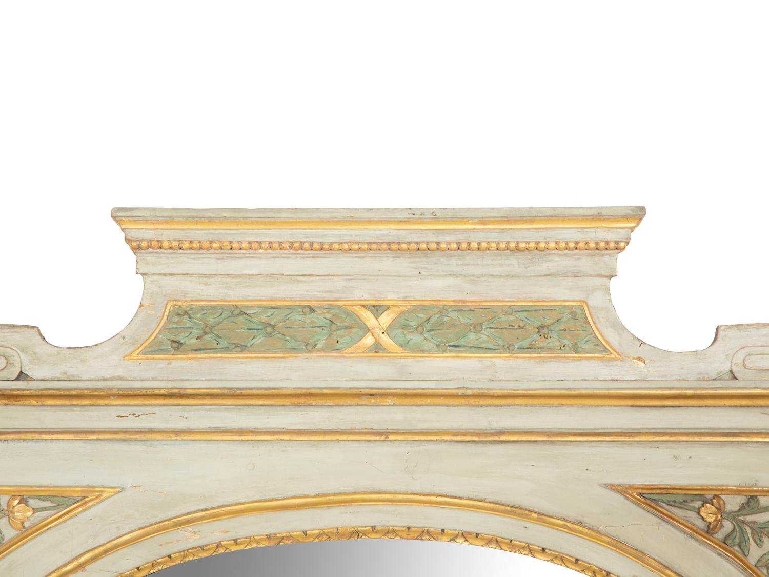 A North Italian Painted and Parcel Gilt Mirror